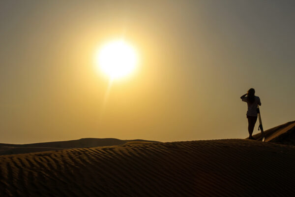 Sandboarding in the sahara desert of Merzouga
